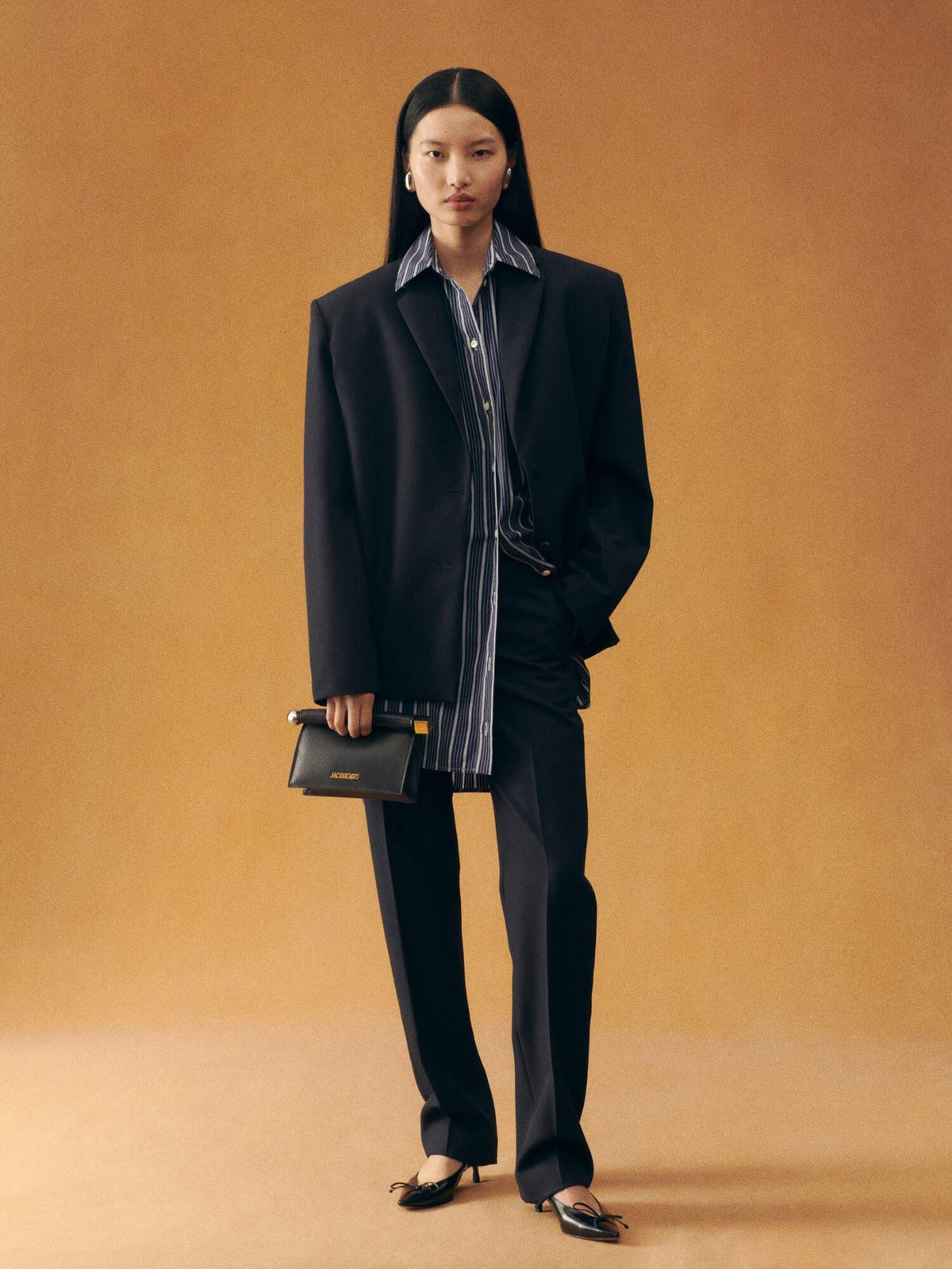The small Rond Carré clutch